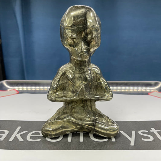 Pyrite Alien carving