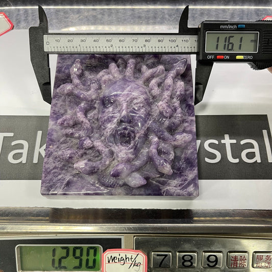 Purple mica Medusa crystal carving